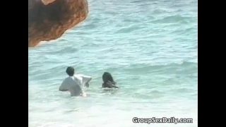 Fantastic group and interracial sex by the sea